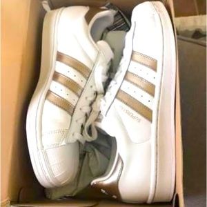 Never worn, new in box Adidas Superstar shoes. Women’s size 10.